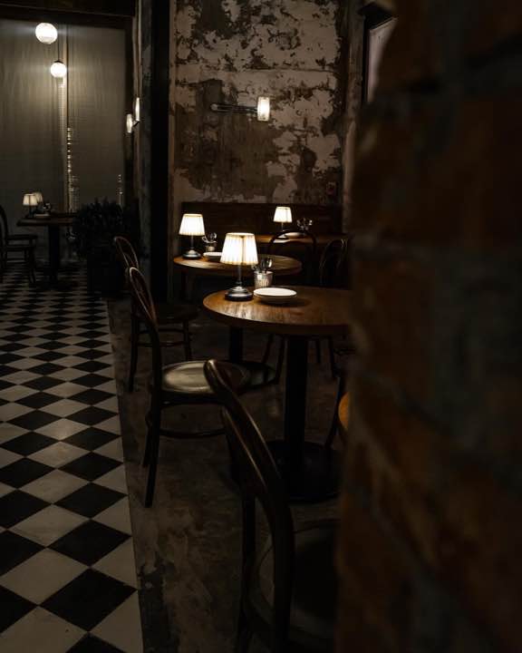 Weathered BRD interior with warm lamplight